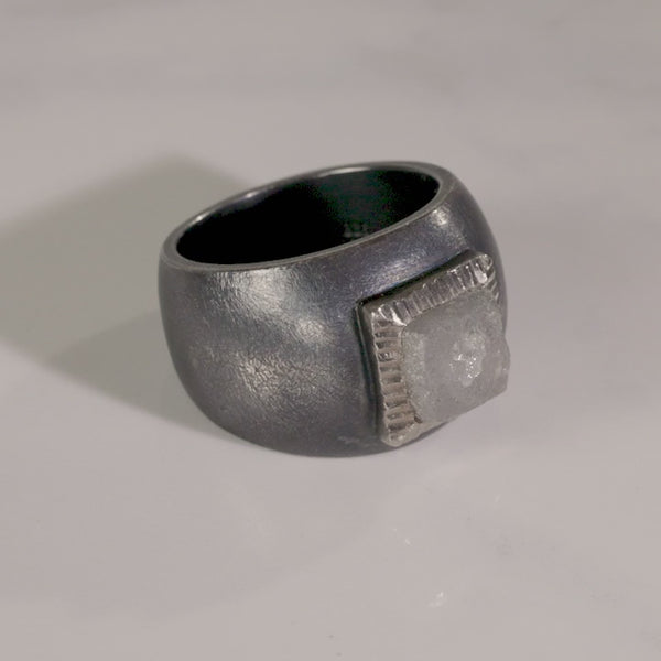 Todd Reed ring made with a large raw diamond cube(9.1ct), palladium, and sterling silver with patina  