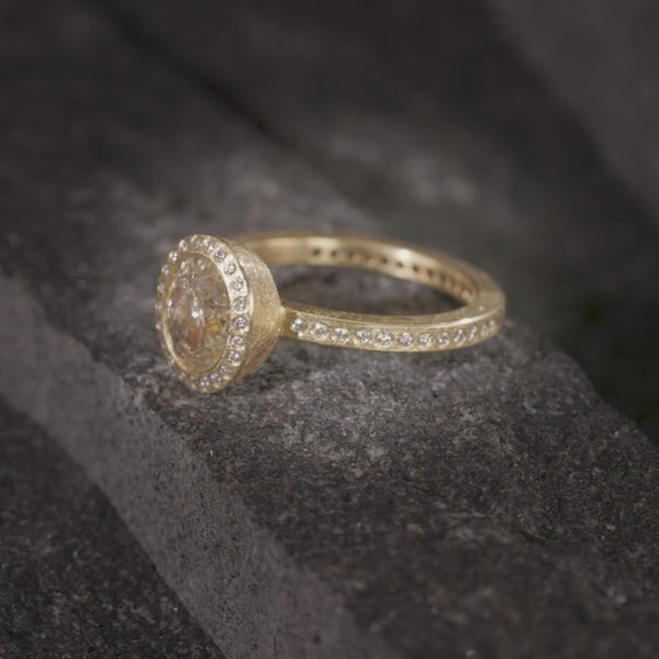 Todd Reed ring in 18 karat yellow gold with natural brown diamond(1.53cts) and white brilliant cut diamonds(.30cts)
