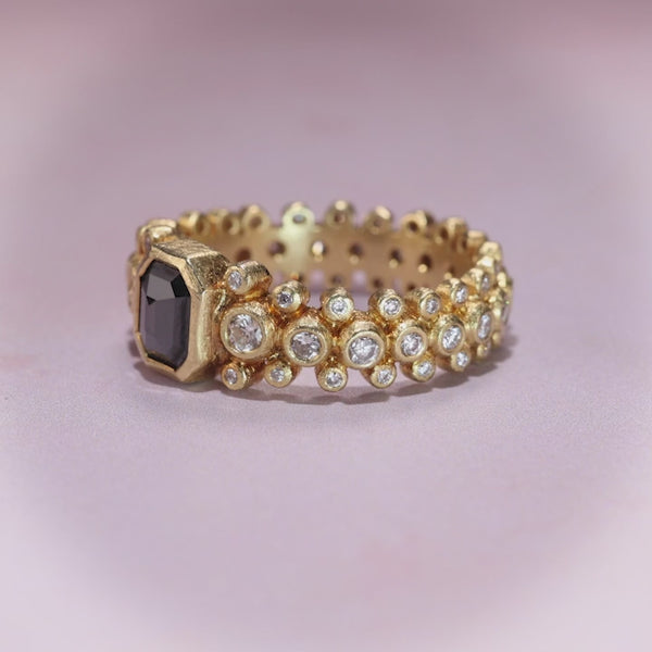 Todd Reed ring in 18 karat yellow gold set with Black diamond(.9cts), and white brilliant cut diamonds(.62cts)