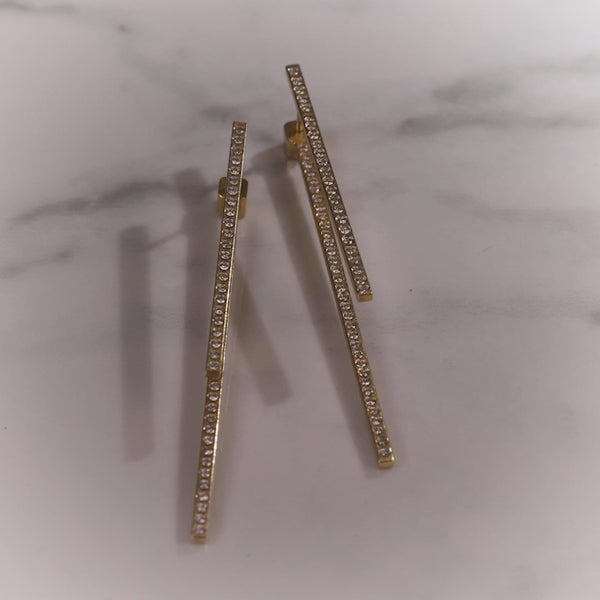 Todd Reed earrings with White brilliant cut diamonds (~1.26ct), and 18k yellow gold.