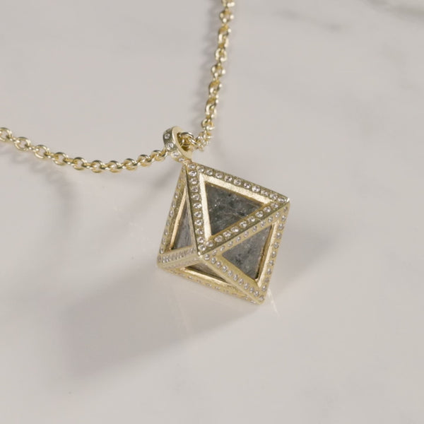 Todd Reed necklace made with 18k yellow gold, Octahedron diamond (~24.97ct), and white brilliant cut diamonds (~.98ct)
