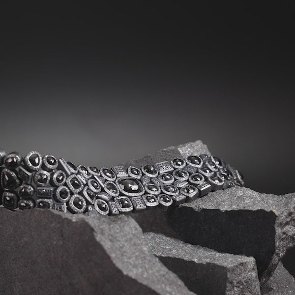 Todd Reed bracelet with Fancy cut black diamonds(~68.01ct), black brilliant cut diamonds(~2.56ct), silver brilliant cut diamonds(~5.14ct), sterling silver with patina.